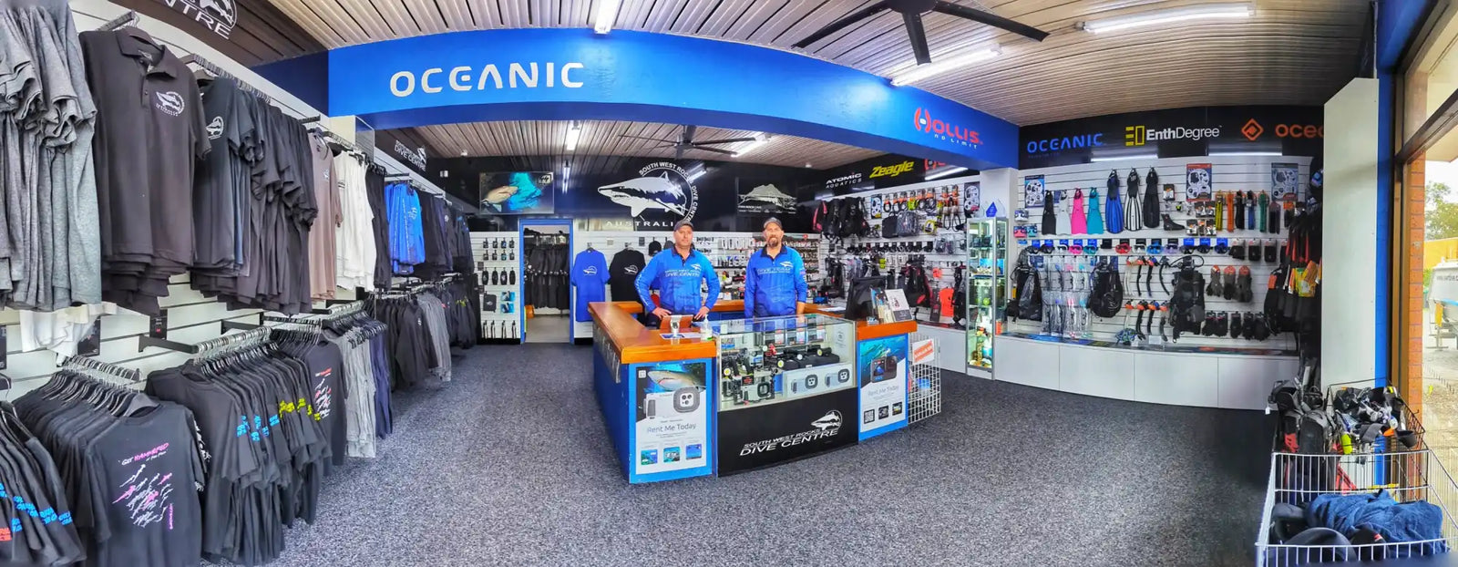Retail store display of scuba diving and water sports equipment and apparel.